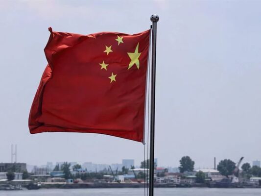 China Defends Economic Model Before Trade Talks